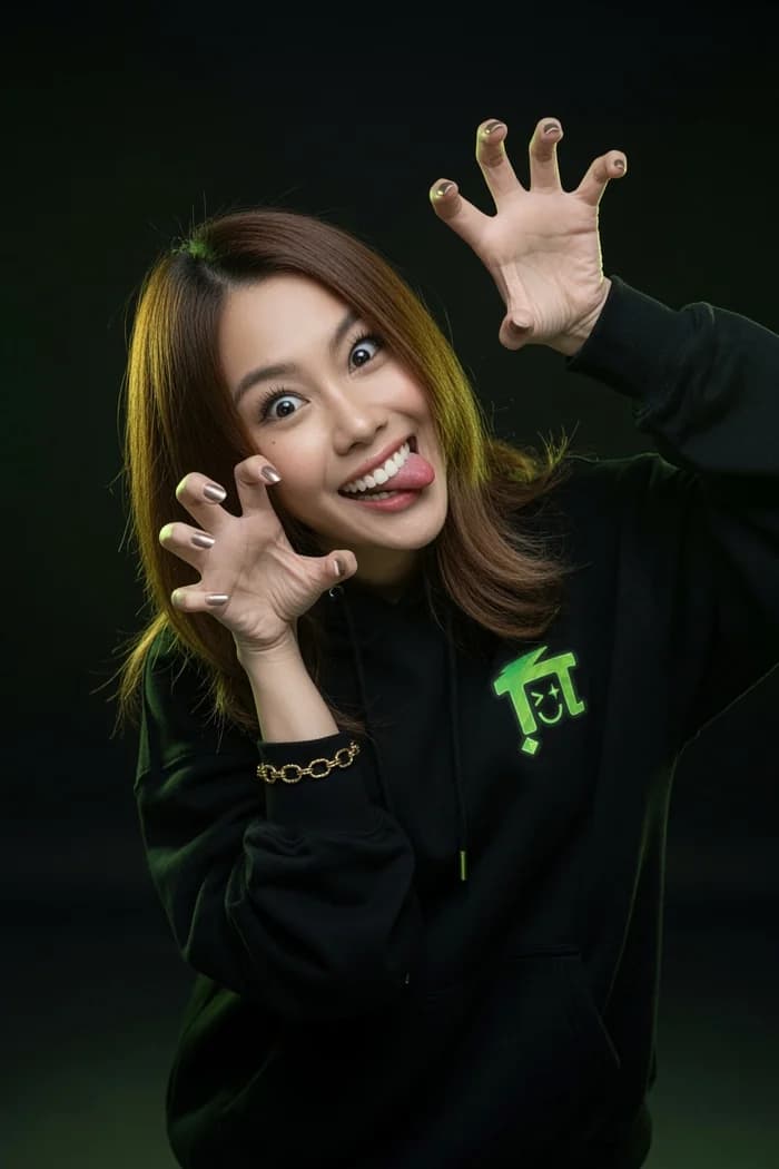 Dark branded apparel with white graphic print worn on a person